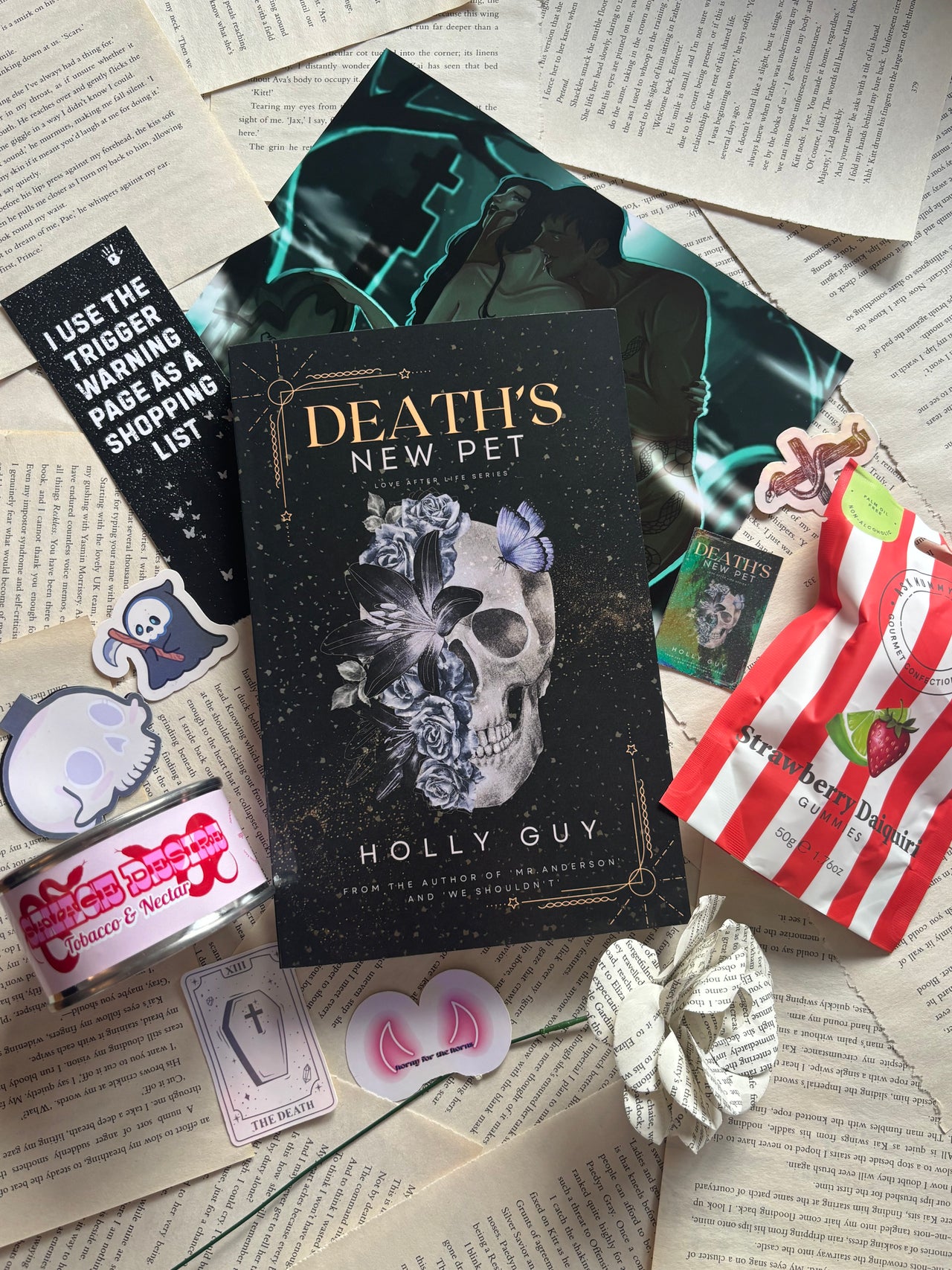 Death’s New Pet by Holly Guy Book Box, includes book, bookmarks, stickers, author note, sweets and candle